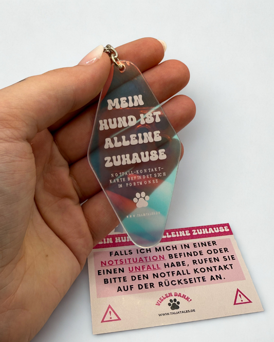 Schlüsselanhänger „Mein Hund ist alleine zuhause“ – holografisch inkl. pinker Notfallkarte