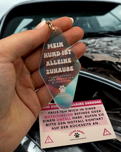 Schlüsselanhänger „Mein Hund ist alleine zuhause“ – holografisch inkl. pinker Notfallkarte